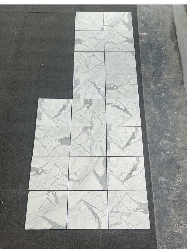 bathroom with white marble tile